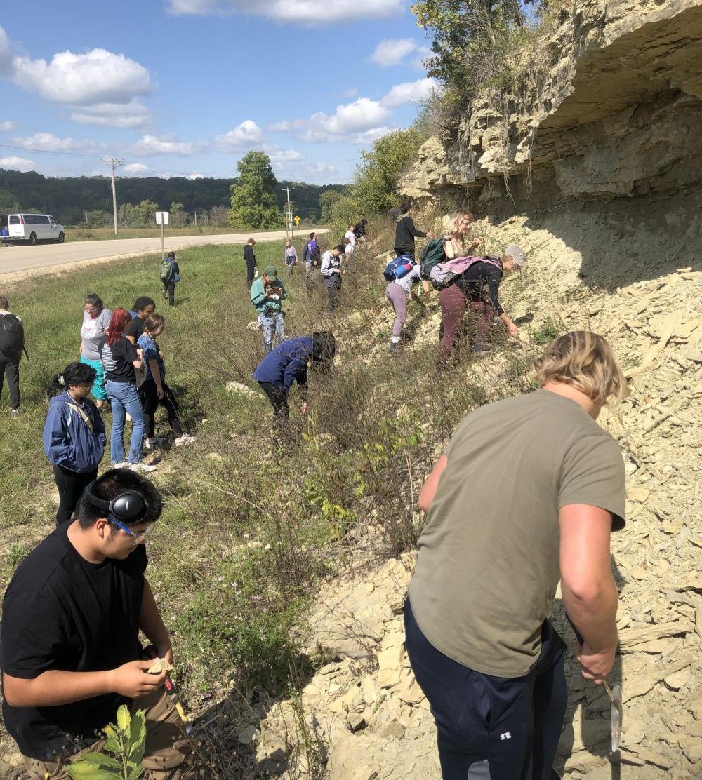Students checking out Paleozoic outcrops.